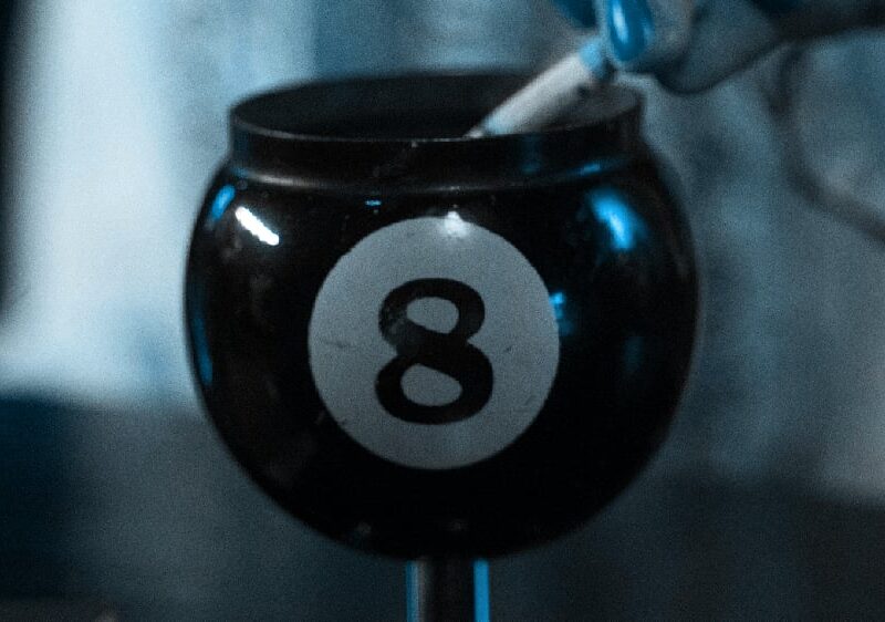 Image of an 8-ball ashtray up close as a representation of one of the ways people consume the marijuana strain Delta 8