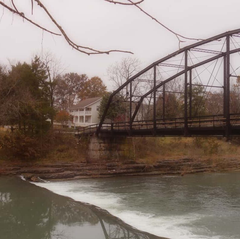 Bridge over the river in Bentonville to show how a new life is possible with addiction treatment near Rogers Arkansas